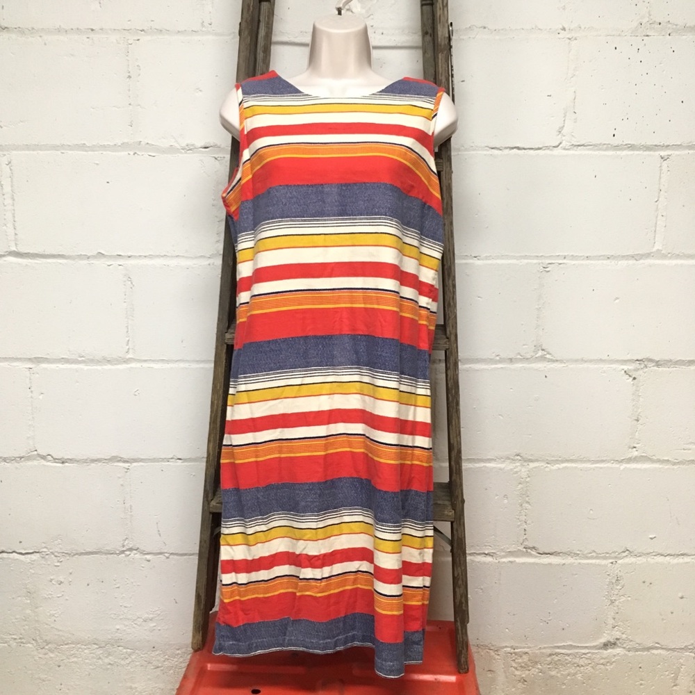 Vintage mid-length, sleeveless dress.